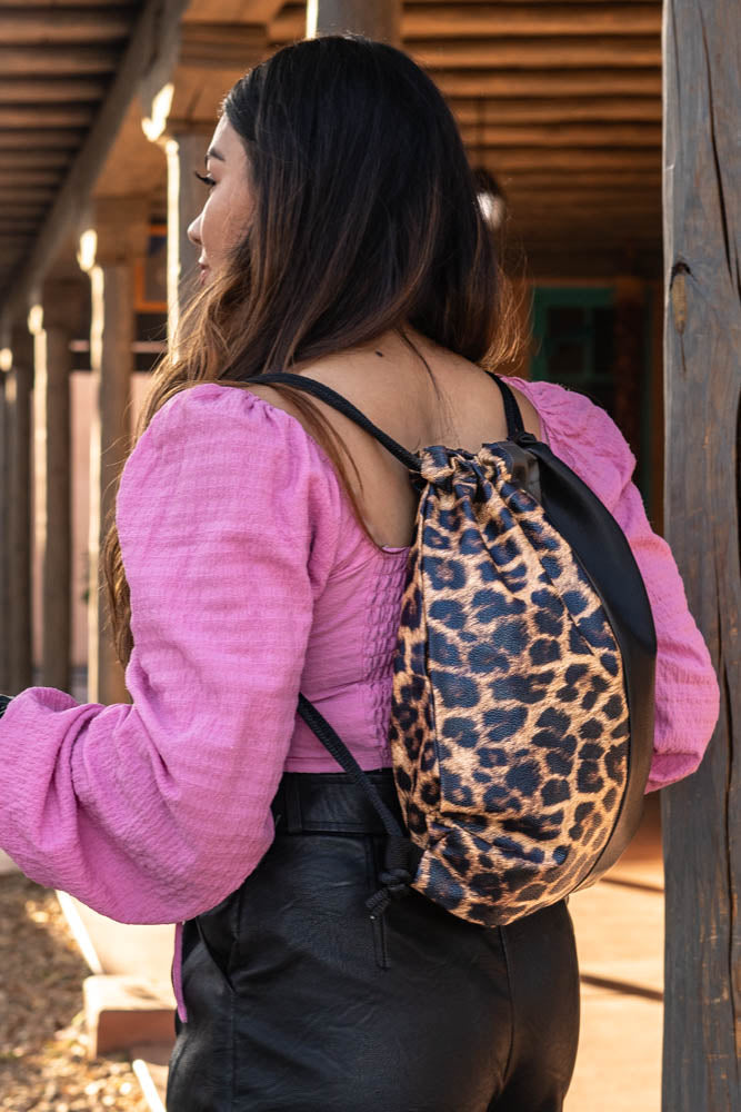 Vegan Leather Two-Tone Leopard Print Drawstring Backpack